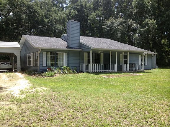 front of house with carport