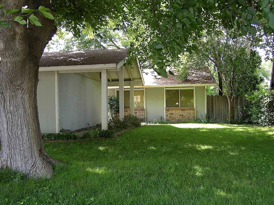 large shade tree in front