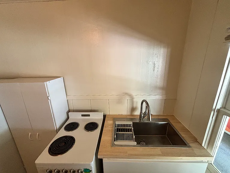 brand new kitchen!! New sink and faucet, cabinet and Pantry and new oven!