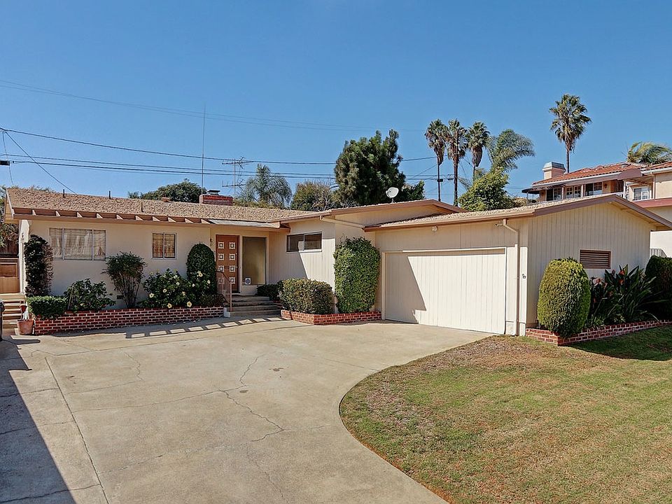 Lovely Street with rolling grass front yard