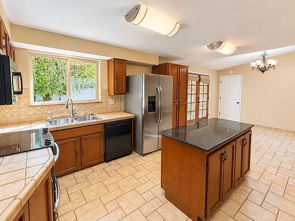 5th image of 10906 E 27th Ave