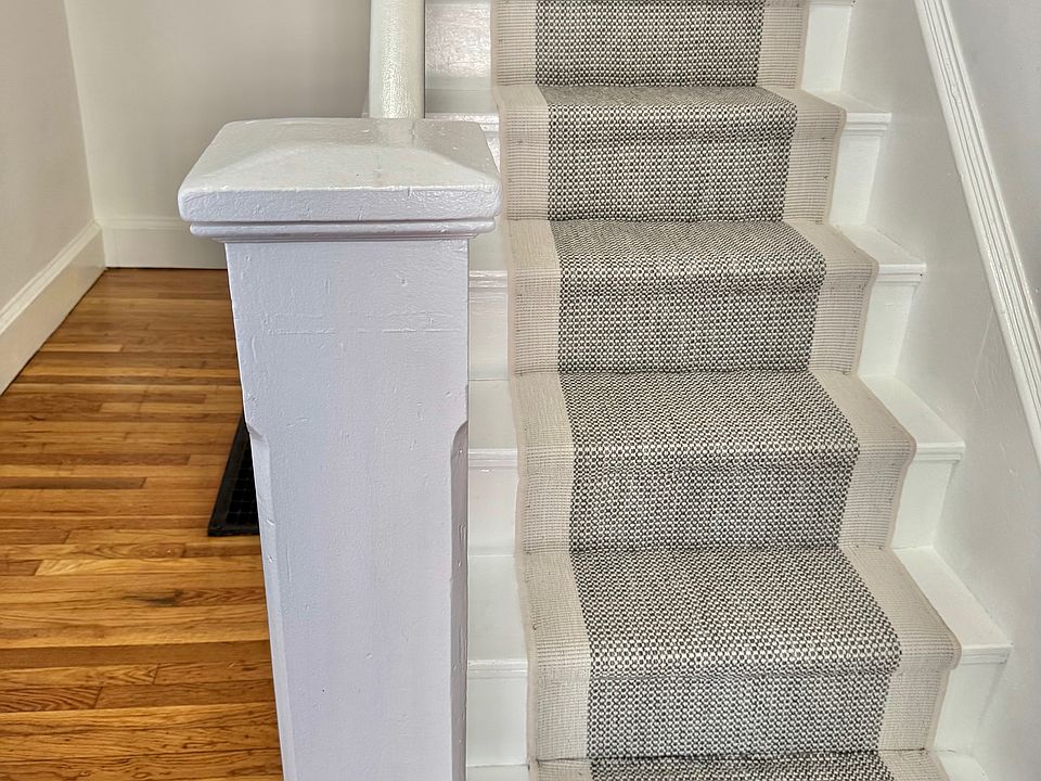 Freshingly finished floors, newly painted stairs and handsome new carpet runner.