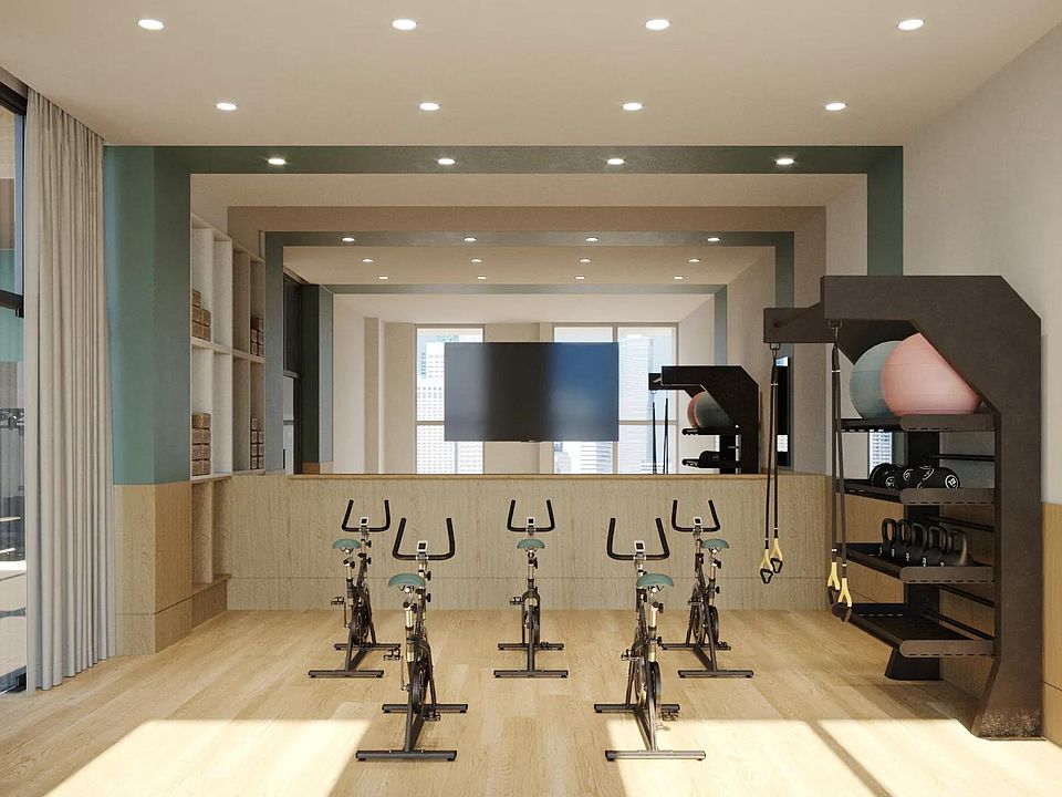 Find your zen in our yoga and pilates studio with Peloton spin bikes.