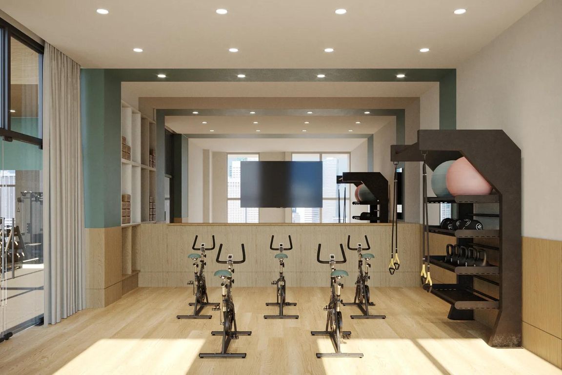 Find your zen in our yoga and pilates studio with Peloton spin bikes.