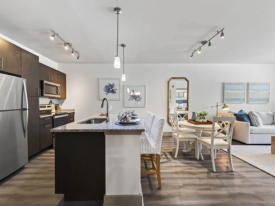 An open kitchen keeps meal prep, dining, and the living area naturally connected.