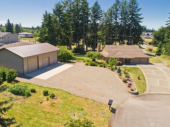 Trees line the back of the property for additional seclusion.