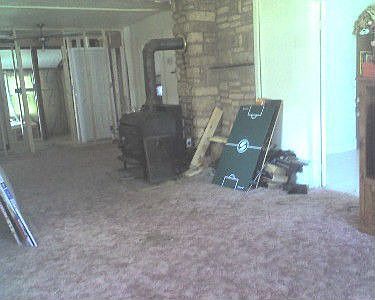 View into LR w/wood stove