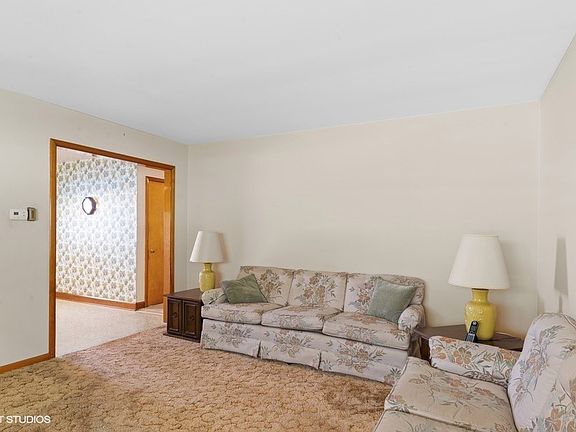 There may be hardwood floors beneath all the carpet!