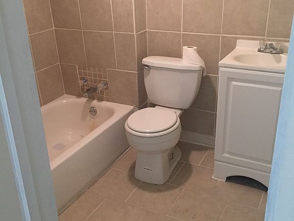 New tile, toilet, vanity