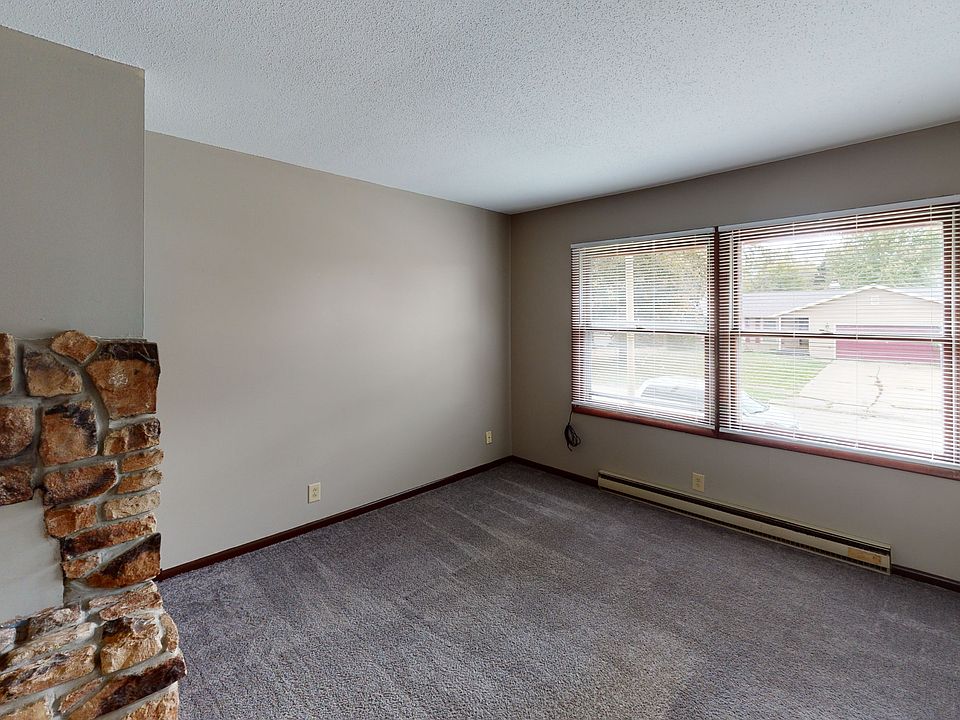 All flooring new laminate - no longer a carpeted space/unit.