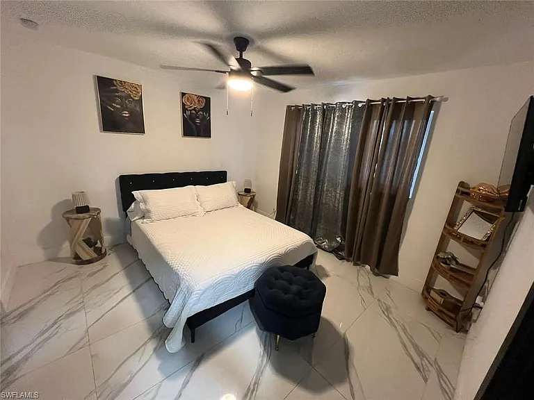 1118 NE Pine Island Ln — Photo 17