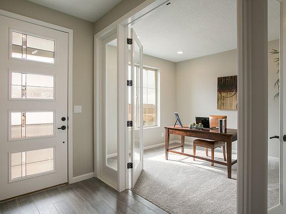 Upon entry you are greeted with a den office space for all your at home work needs.