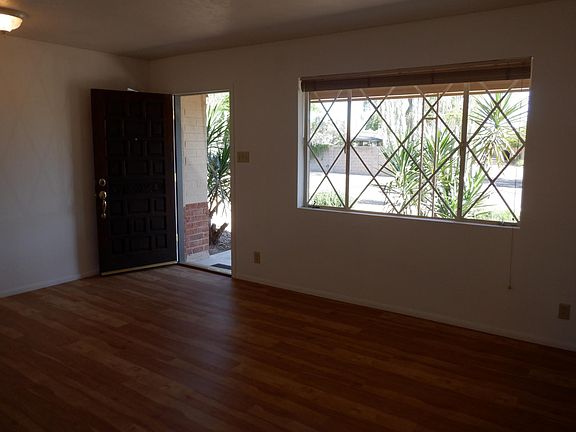 Through the front door is the living room.