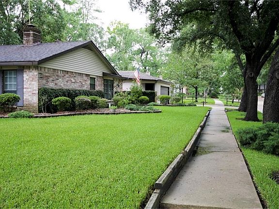 Mature Oak Trees outline the street