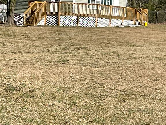 This is a photo of the 900 ft._ COTTAGE. With a view of the old growth trees on the property..