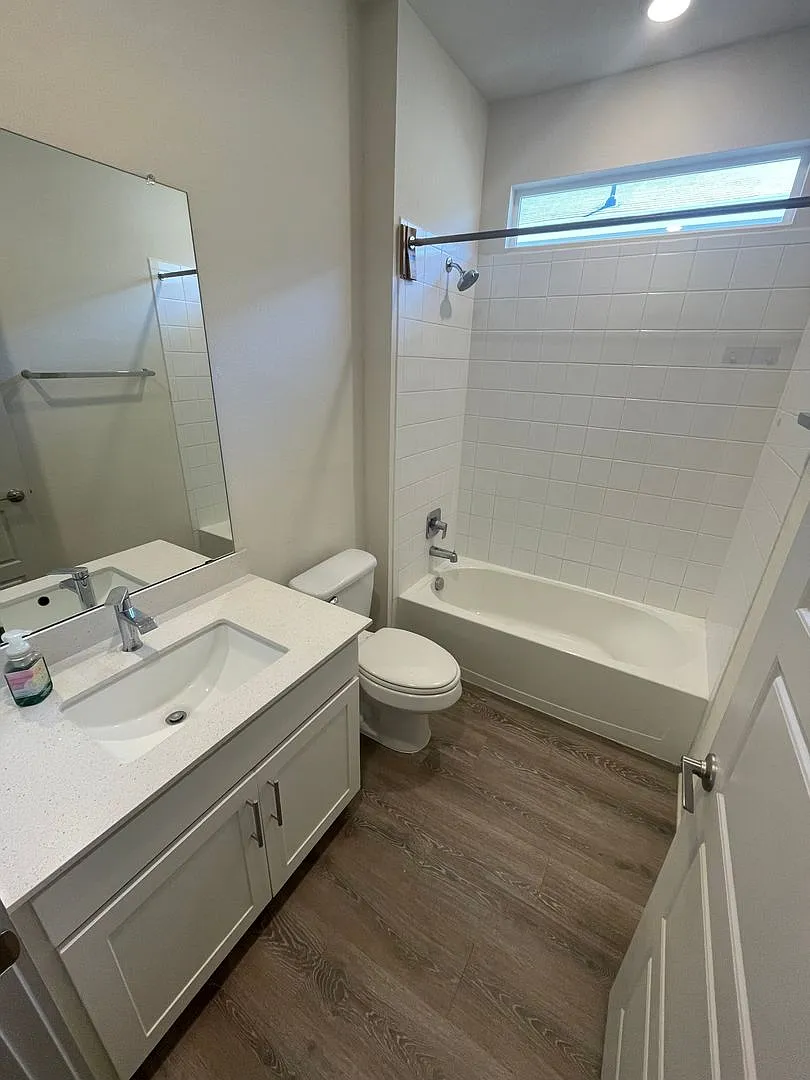 3 bed 2 bath home with attached garage and fenced in backyard built in 2023 — Photo 4