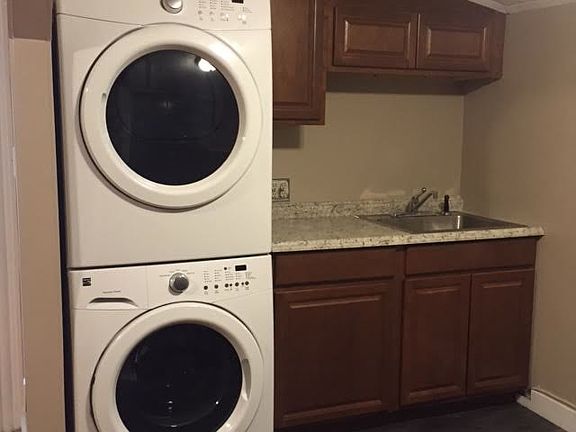 Kitchen w/ brand new washer/dryer units