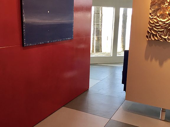 Entry with rotating wall