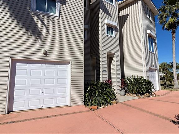 Circular Driveway offers easy access to garages plus plenty of additional parking for family and guests