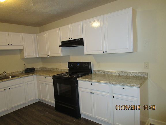 Kitchen with white cabinets