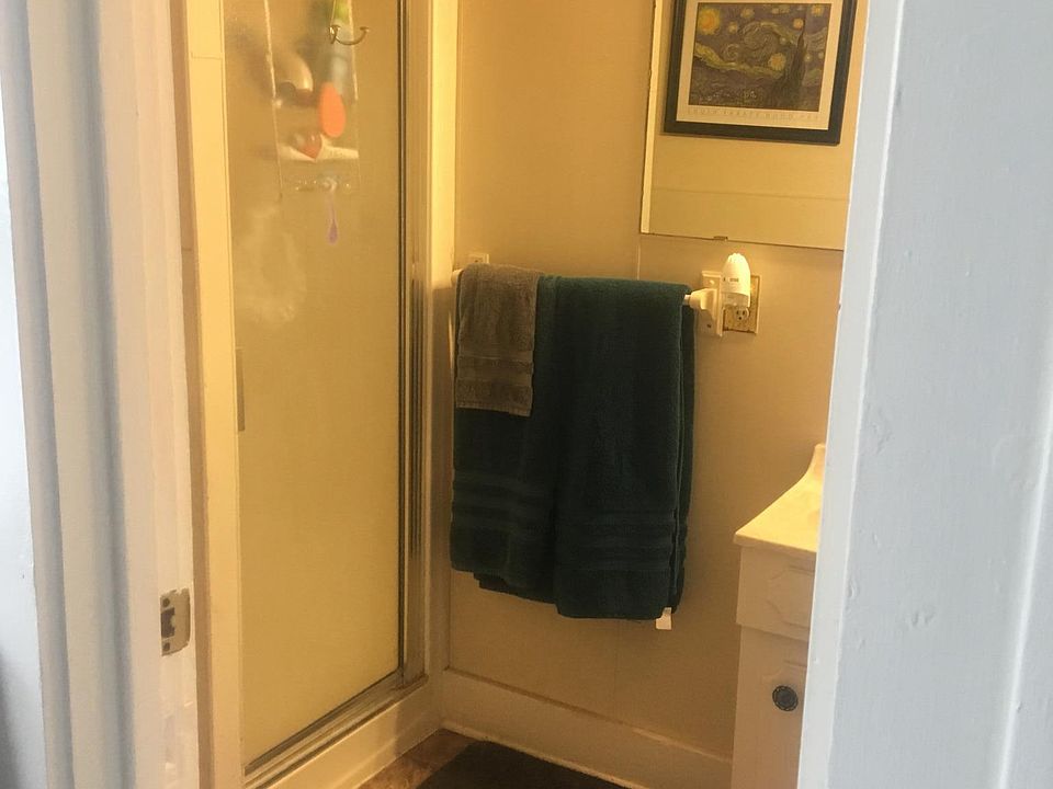 3/4 bath with toilet, sink, standup shower