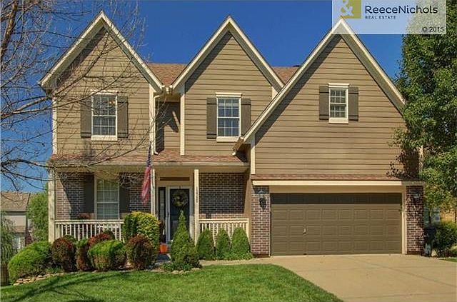 Front elevation, charming front porch.