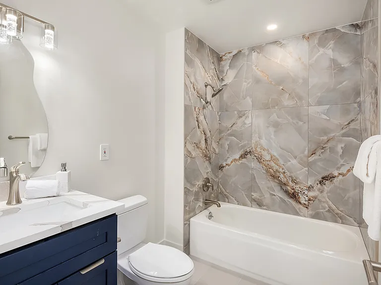 Full bath on the lower level of kids entertainment
