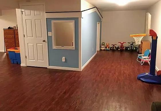 Door to carpeted stairs