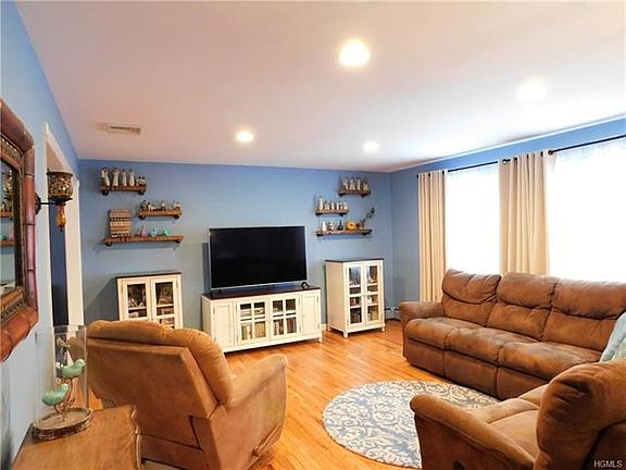 Sunshine lights up the living area.