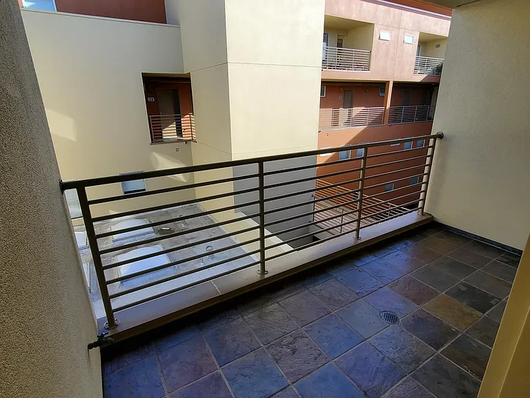 Balcony located off the primary suite offers fresh air and extra space to relax and unwind.