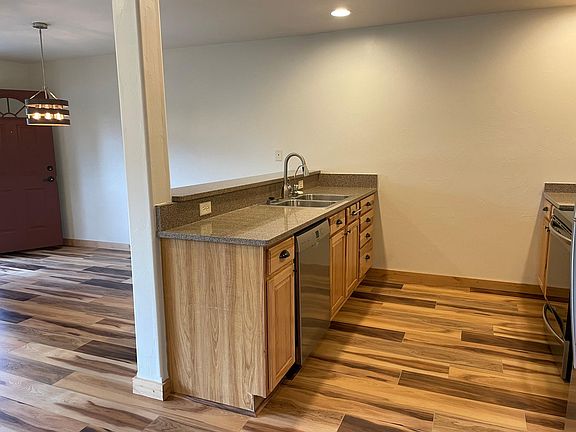 Kitchen and sink facing dining room
