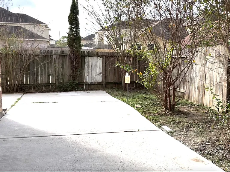 Backyard with concrete and no grass