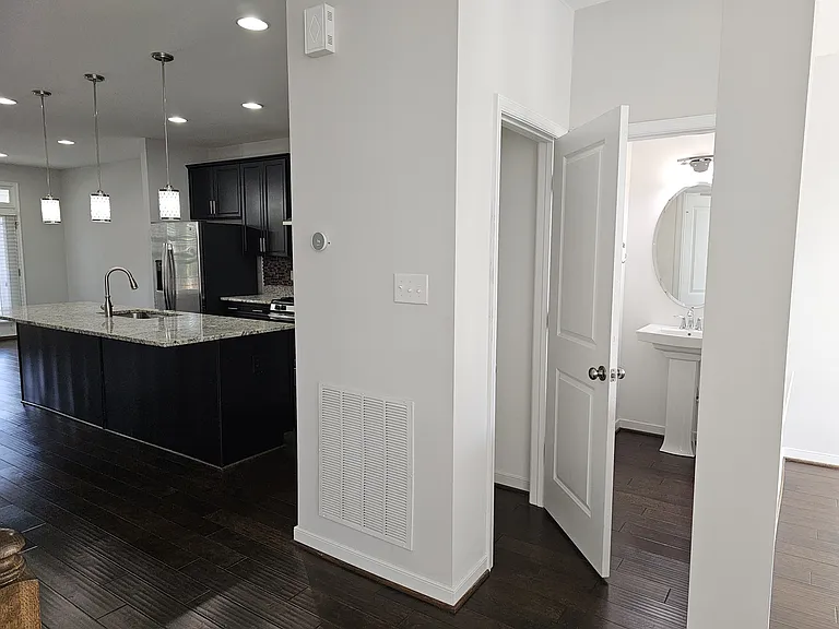 Main Floor Powder room + Closet