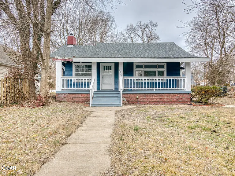1321 W Broadway St — Photo 1