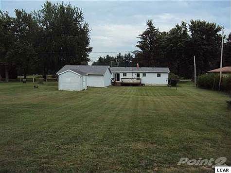 Large Back Yard with Garage and Shed