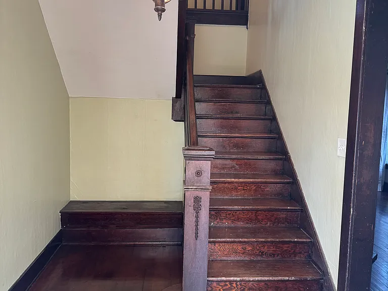 Grand staircase to this gorgeous 1906 home