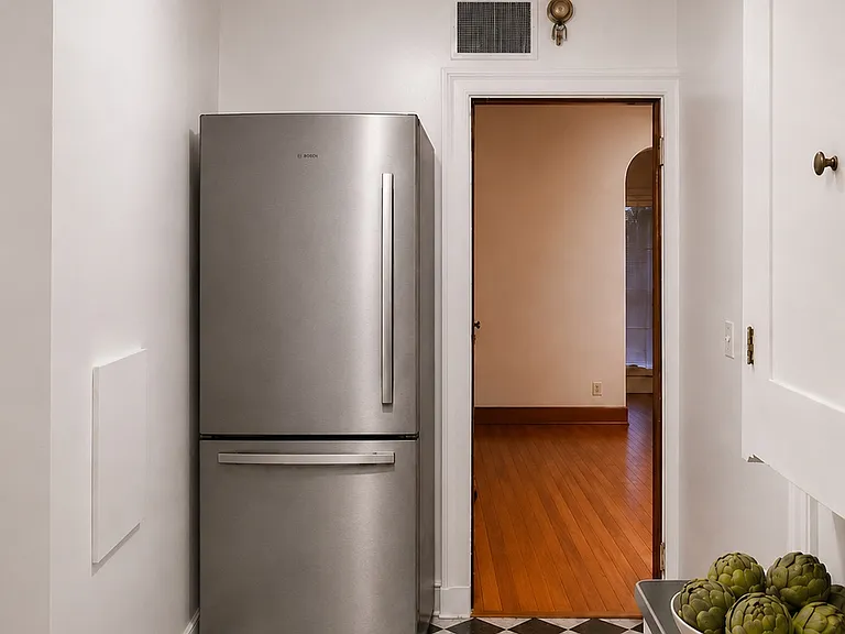 Kitchen with brand new stainless steel refrigerator