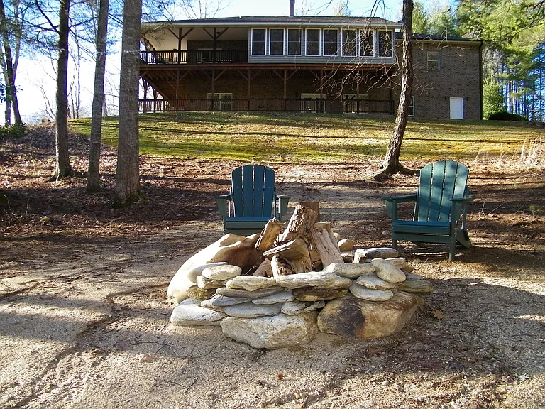 Private beach area allows for warm weather tubing, cool weather fire pit time, and year round fishing.