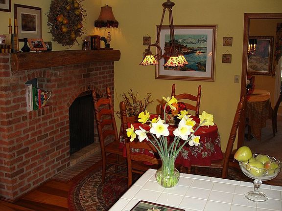Wonderful, Cozy Eat-In Kitchen with WB Fireplace.
