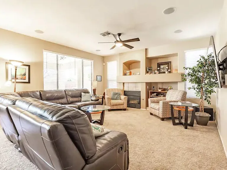 Comfortable family room with surround sound and large flat panel TV