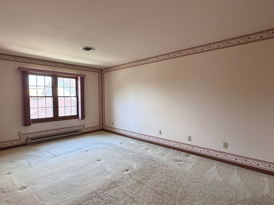 Primary bedroom with walk in closet