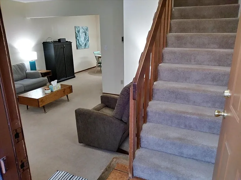 Entry to living room & stairs to bedrooms