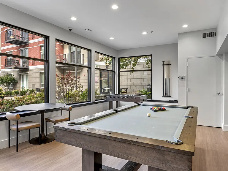 Community Game Lounge at Avant at the Arboretum Apartments in Lisle, IL 60532
