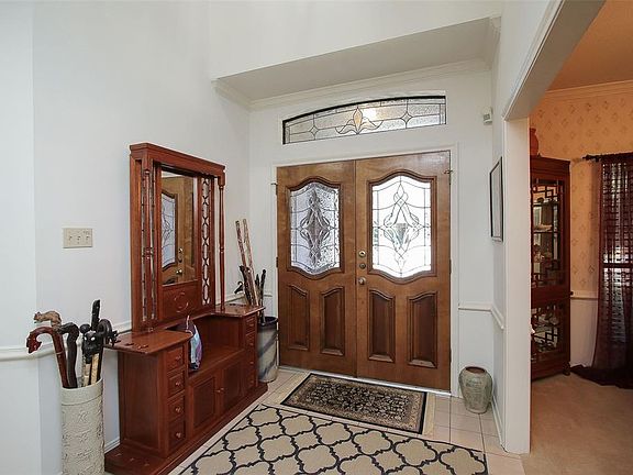 Beautiful double doors with etched glass and matching transom