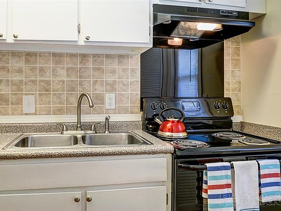Kitchen with Double Sink & Black Appliances
