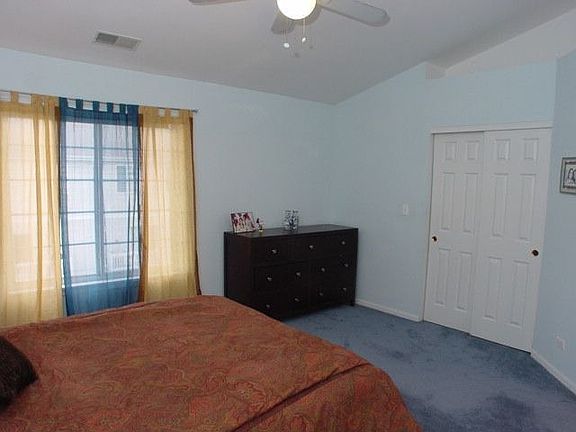 Mster bedroom with vaulted ceiling