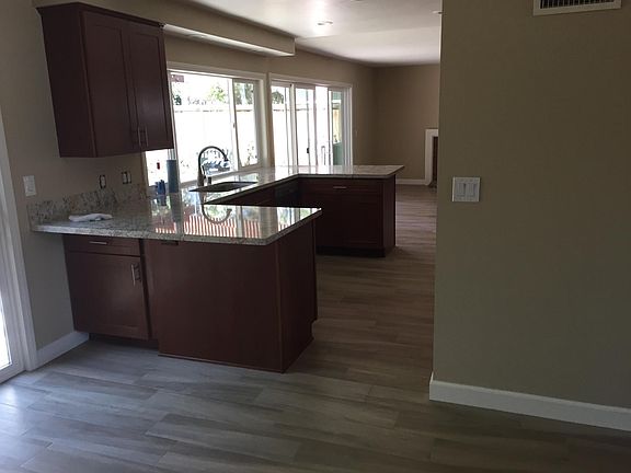 kitchen view to enclosed back yard