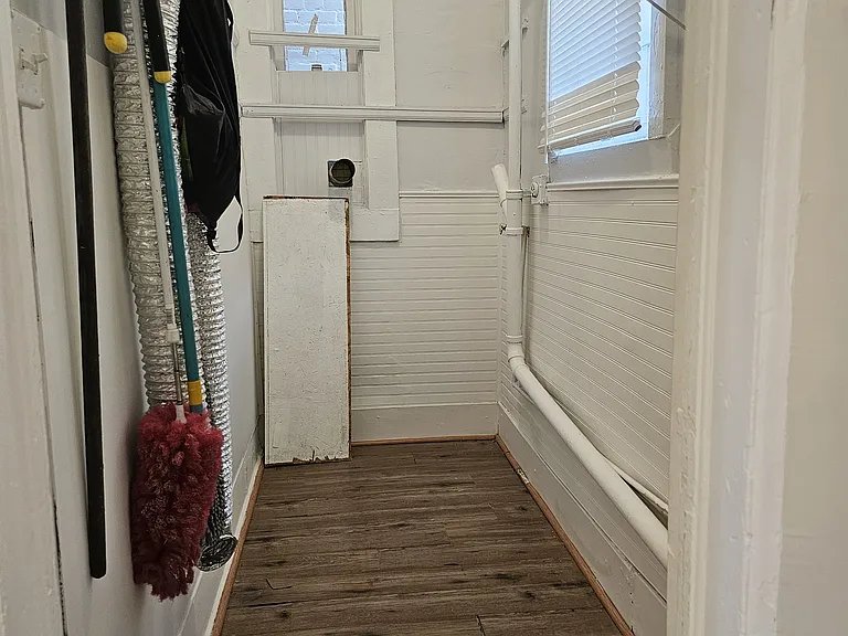 Laundry room. New stackable washer & dryer not shown but included.