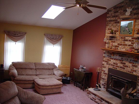 2nd View of Great Room With Ceiling Fan