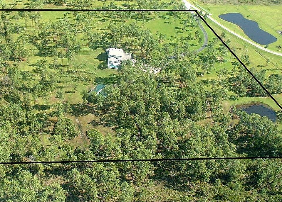 9+ Acres fenced, gated, barn, pool!